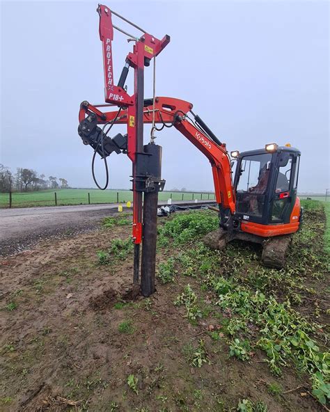 mini digger post knocker hire near me|digger mounted post knocker.